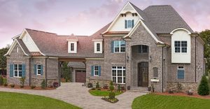 Big house using Pine Hall Brick's Casa Grande with white mortar and cocoa pavers.