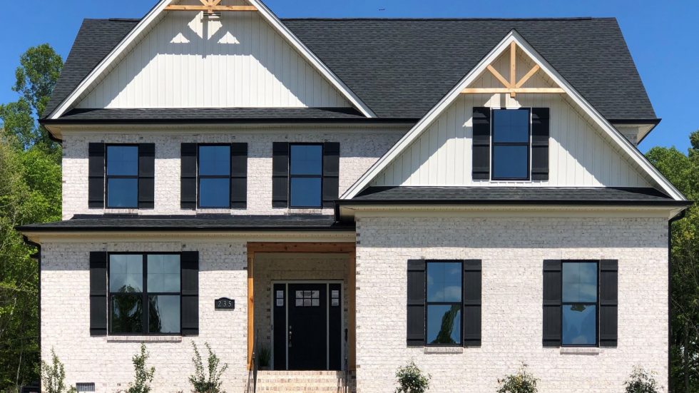 Use light colored brick for the farmhouse look and a better value