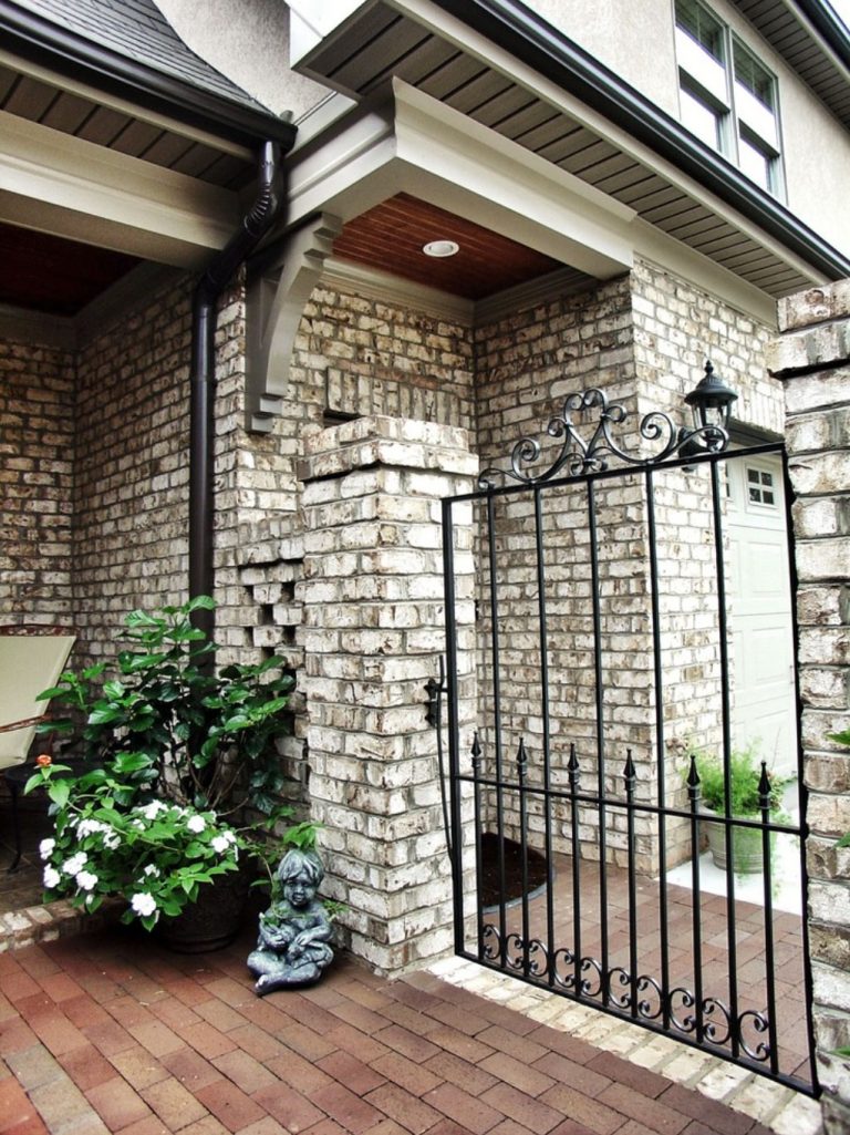 Tips for pairing pavers with a brick home