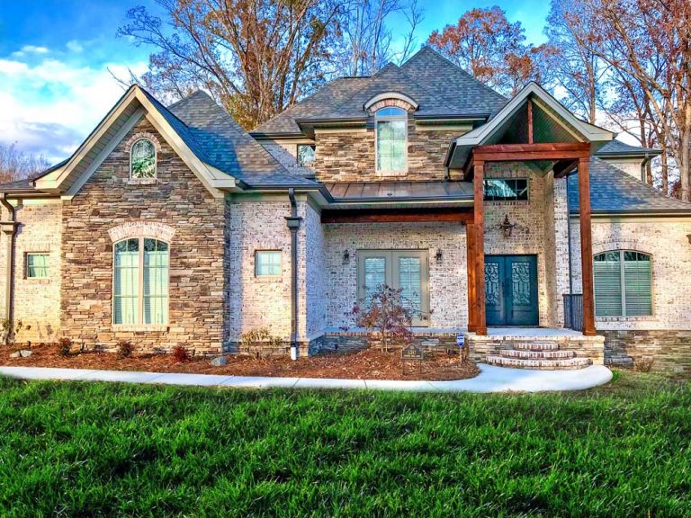 Use light colored brick for the farmhouse look and a better value