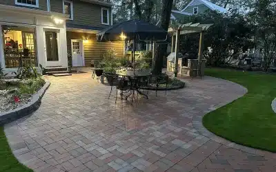 Real Hardscapes & Landscape create a “forever garden” with pavers, water, and illumination